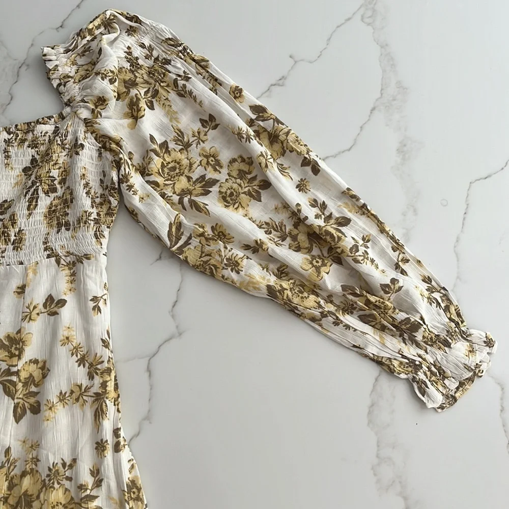 Free People Jaymes Floral Midi Dress in Pastry Cream with balloon sleeves